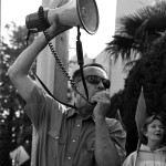 Man with megaphone at strike